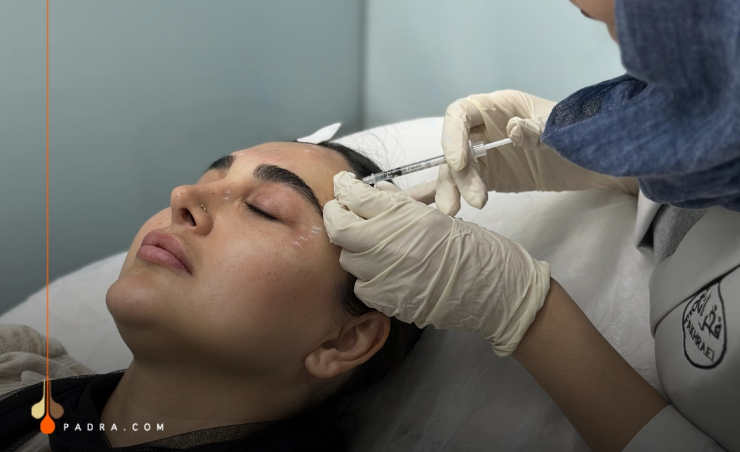 woman during botox injection procedure
